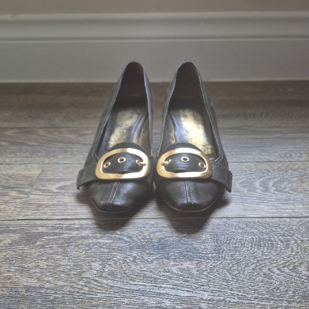 Prada Black and Gold Flats with Classic Slip-On Design